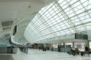 Toronto, Canada: Travellers walking through Terminal 3 of Toronto Pearson International Airport.